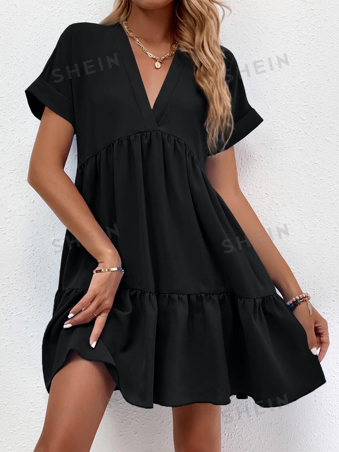 LUNE Roll Cuff Ruffle Hem Solid Dress