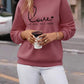 LUNE Heart And Slogan Graphic Drop Shoulder Sweatshirt Love Is All You Need