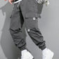 Manfinity Hypemode Loose Fit Men's Cargo Pants With Slogan Graphic, Flap Pocket, And Drawstring Waist