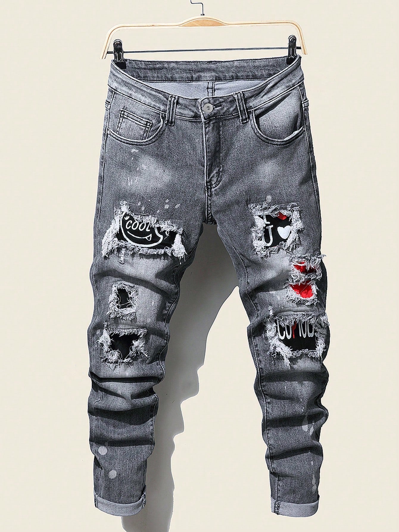 Manfinity LEGND Men Splash Ink Print Ripped Frayed Rag Stitching Jeans